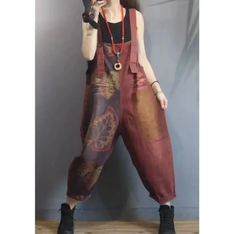 Spring and summer new oversize retro print stitching contrast denim suspenders women's loose harem Jumpsuit
Spring and summer new oversize retro print stitching contrast denim suspenders women's loose harem Jumpsuit