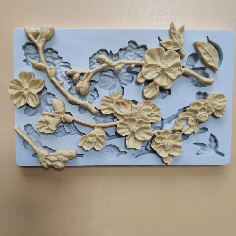 Silica gel mould of plum petals and leaves turning sugar DIY chocolate cake decoration mold Kitchen Baking tools 
Silica gel mould of plum petals and leaves turning sugar DIY chocolate cake decoration mold Kitchen Baking tools