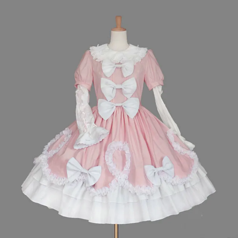 Женское платье в стиле лолита розовое с кружевным бантом и круглым вырезом -