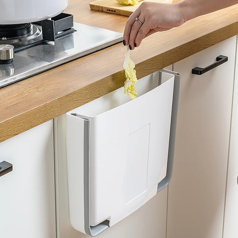 Kitchen wall-mounted foldable trash can household plastic hanging debris storage barrel multi-function cabinet door hanging type
Kitchen wall-mounted foldable trash can household plastic hanging debris storage barrel multi-function cabinet door hanging type