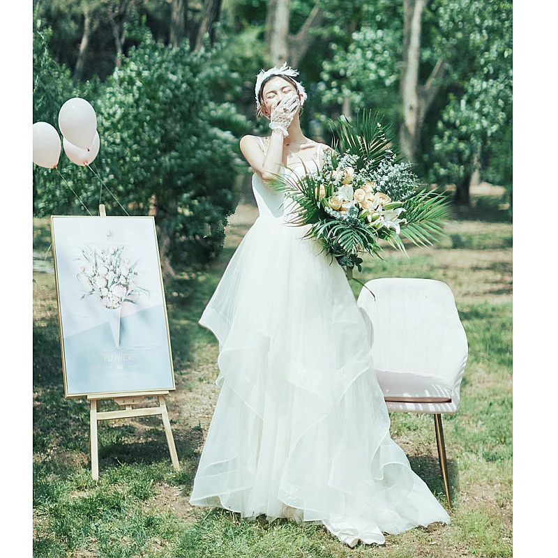 Luxurious Simple light wedding dress Mori series 2021 new bride's go out gauze sling super fairy dream travel photo light
Luxurious Simple light wedding dress Mori series 2021 new bride's go out gauze sling super fairy dream travel photo light