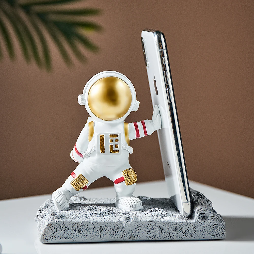 Nordic Figurine Astronaut Ornament Table Craft Phone Stand Holder Bracket Decor Figurines Home Living Room Decoration Gifts
Nordic Figurine Astronaut Ornament Table Craft Phone Stand Holder Bracket Decor Figurines Home Living Room Decoration Gifts
