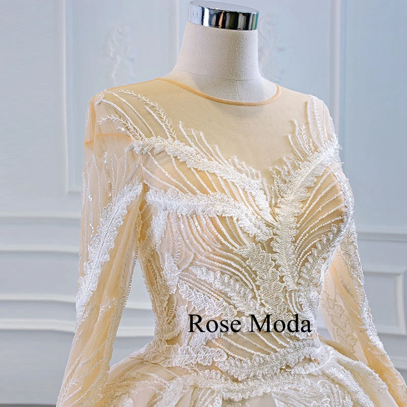 Rose Moda Luxury Long Sleeves Ivory and Champagne Lace Wedding Dress with Long Train
Rose Moda Luxury Long Sleeves Ivory and Champagne Lace Wedding Dress with Long Train