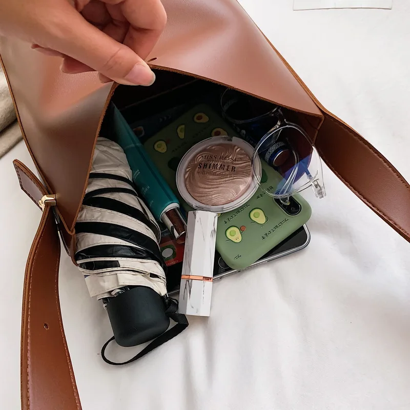 Fashion Wild Bucket Bag Simple Style PU Leather One Shoulder Female Handbag Female Bag Casual Black / Brown
Fashion Wild Bucket Bag Simple Style PU Leather One Shoulder Female Handbag Female Bag Casual Black / Brown