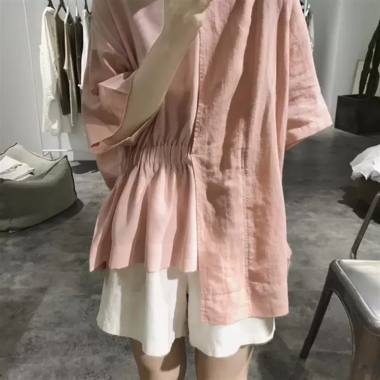2021 summer irregular stitching cotton and linen shirt Korean version loose and thin elastic band round neck top women
2021 summer irregular stitching cotton and linen shirt Korean version loose and thin elastic band round neck top women