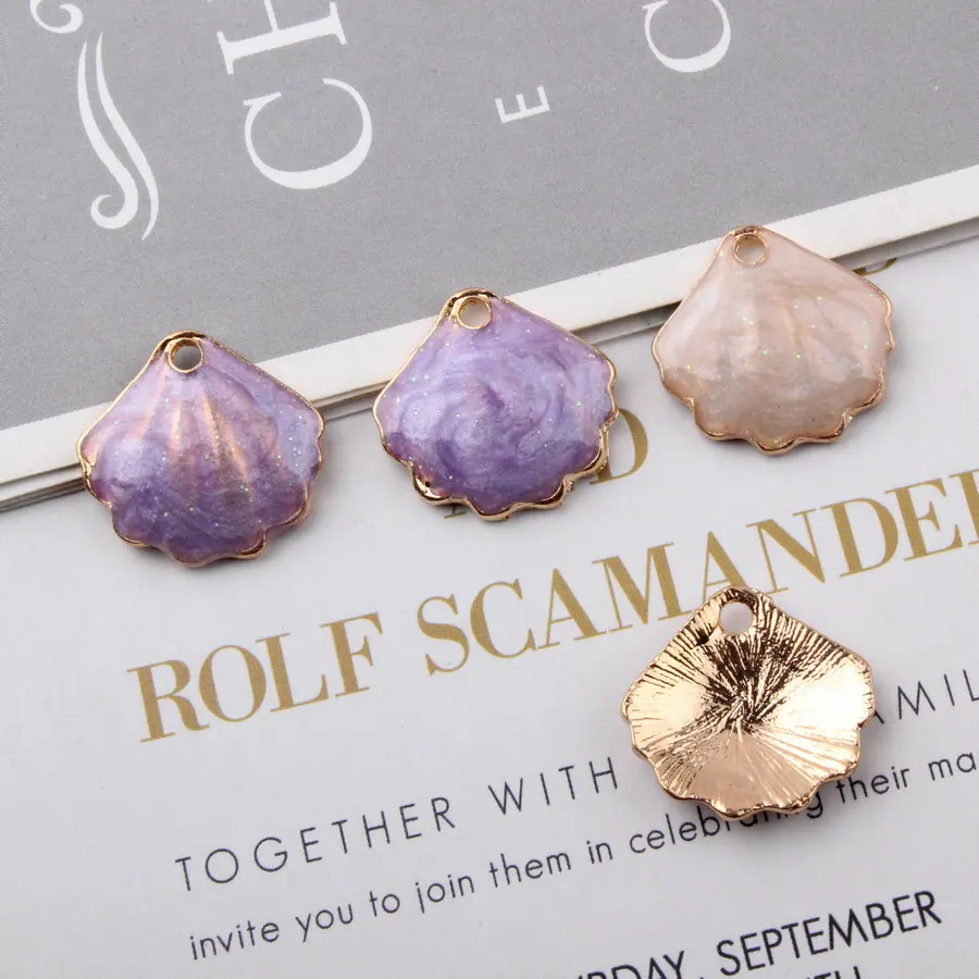 10PCS/Lot Fashion Scallop shell Design Enamel Alloy Metal Dangle Charms Pendant For DIY Earring Necklace Jewelry Findings Making 
10PCS/Lot Fashion Scallop shell Design Enamel Alloy Metal Dangle Charms Pendant For DIY Earring Necklace Jewelry Findings Making