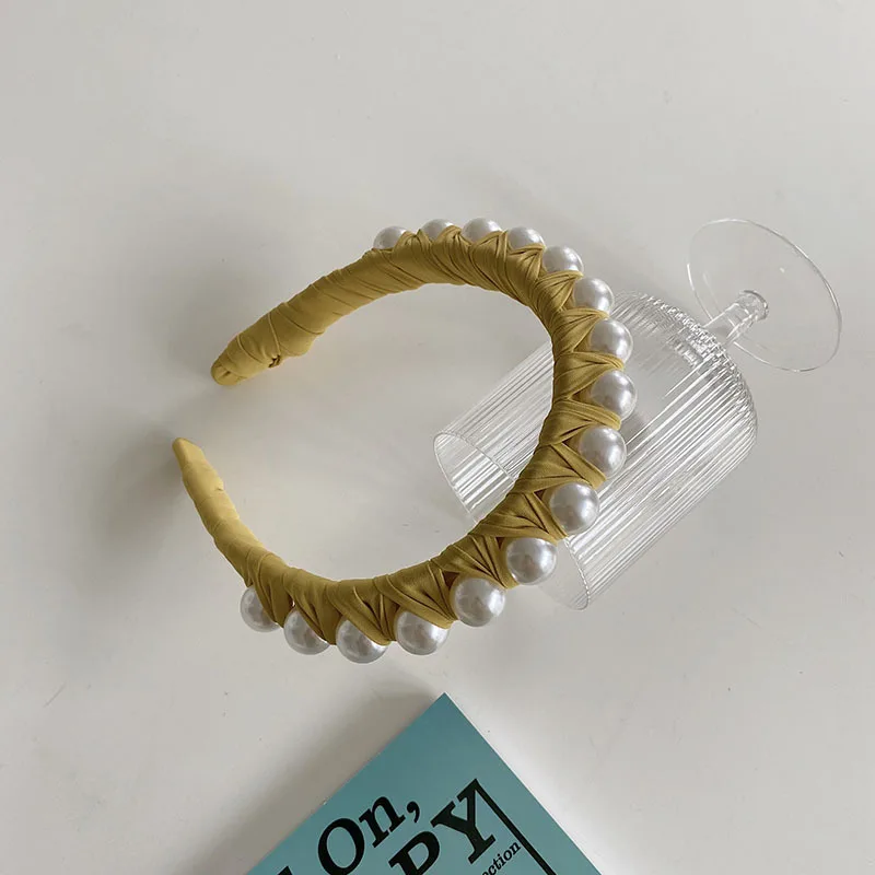 Korean version of the new ins winding pearl headband braided bridal headband small fresh hairhoop hair accessories women
Korean version of the new ins winding pearl headband braided bridal headband small fresh hairhoop hair accessories women