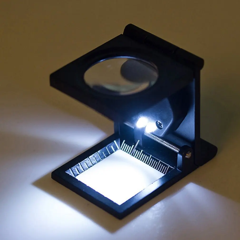 10x Scale Magnification 2 LED Lupa Optical Lenses Magnifying Glass Foldable Scale Magnifier Illumination Light Printing fabric
10x Scale Magnification 2 LED Lupa Optical Lenses Magnifying Glass Foldable Scale Magnifier Illumination Light Printing fabric
