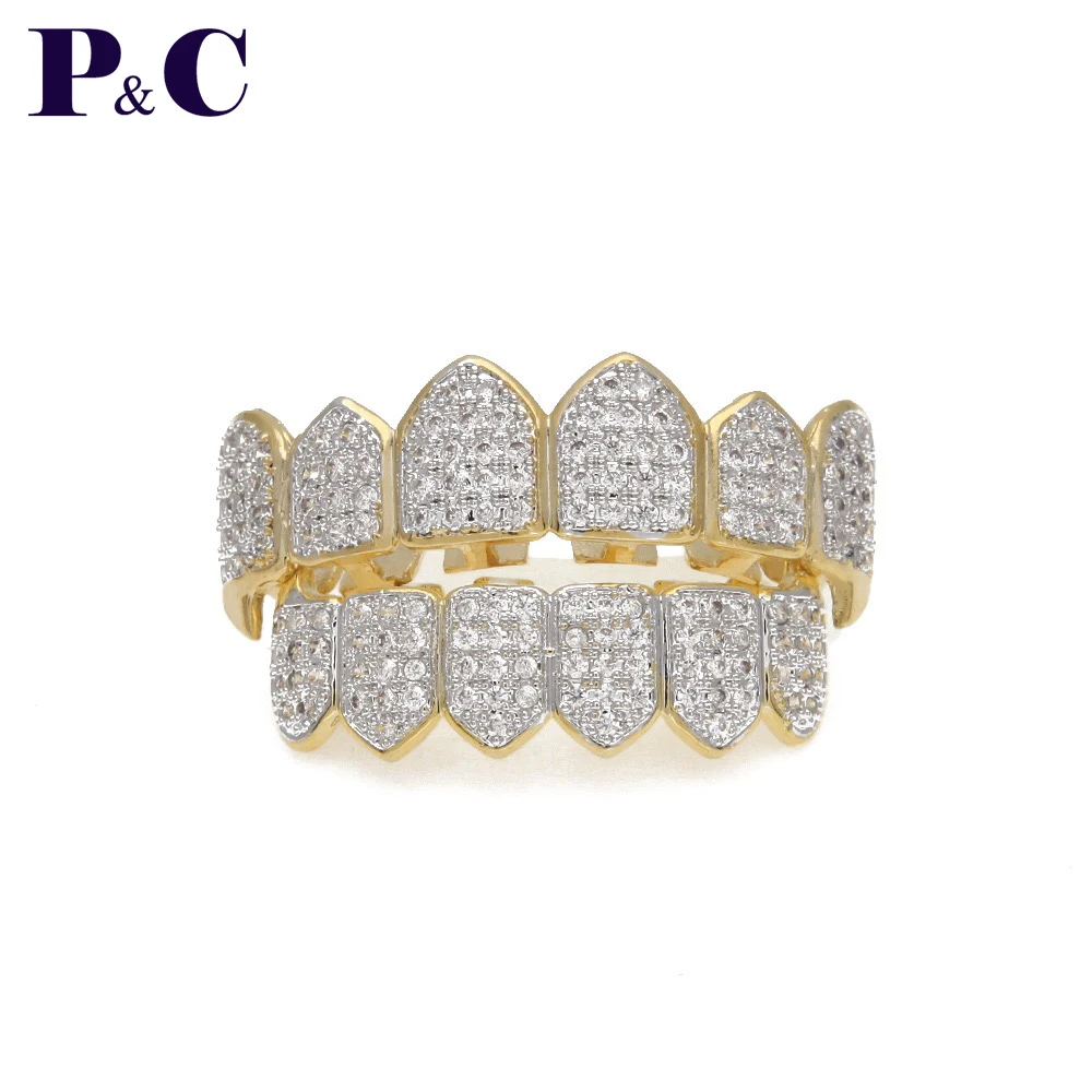 Hip hop grillz teeth Iced Out CZ Fang Mouth teeth grills Caps bling jewelry unisex top bottom rap Jewelry for Party
Hip hop grillz teeth Iced Out CZ Fang Mouth teeth grills Caps bling jewelry unisex top bottom rap Jewelry for Party