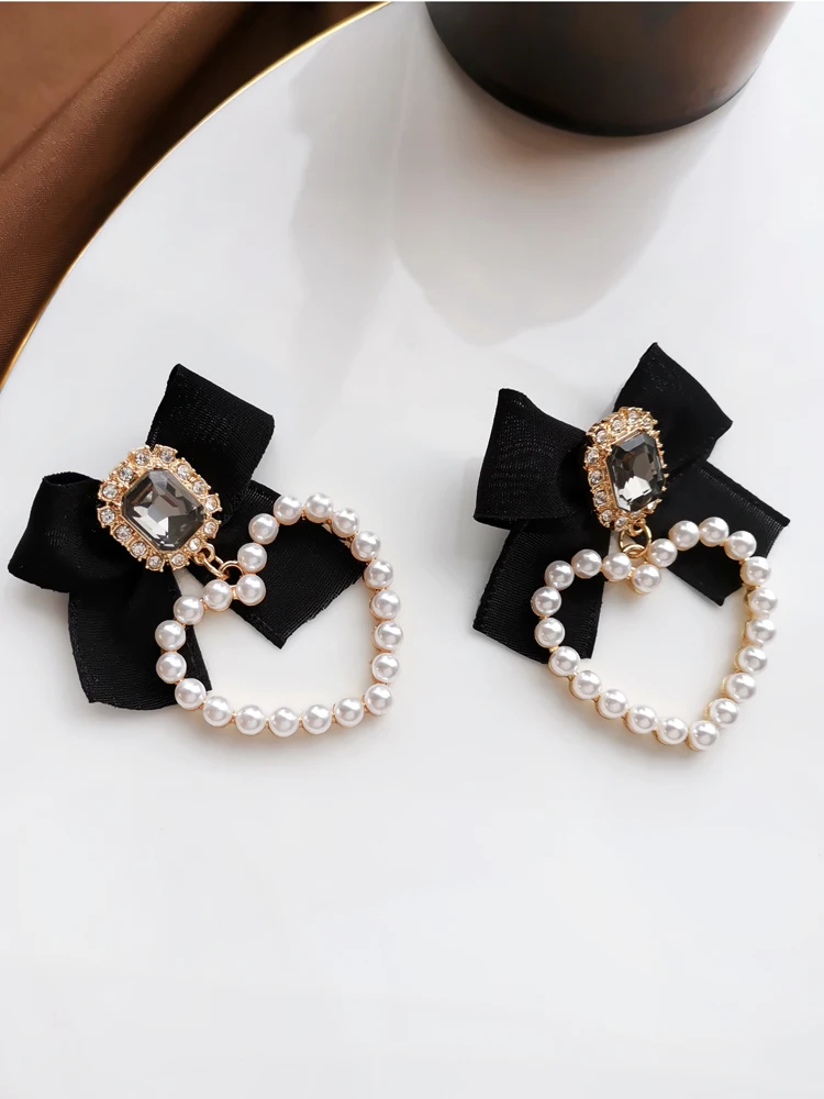 S925 needle Sweet Jewelry Black Bowknot Earrings 2021 New Design Crystal Glass Simulated Pearls Heart Drop Earrings For Girl
S925 needle Sweet Jewelry Black Bowknot Earrings 2021 New Design Crystal Glass Simulated Pearls Heart Drop Earrings For Girl