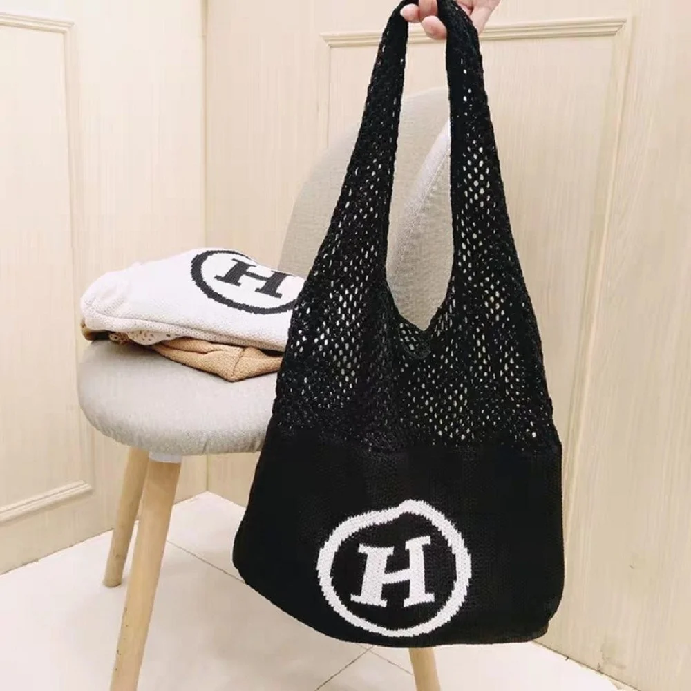 2021 new high-quality large-capacity wind mesh knitted bag shoulder bag female Korean version of the H letter woven shopping bag
2021 new high-quality large-capacity wind mesh knitted bag shoulder bag female Korean version of the H letter woven shopping bag