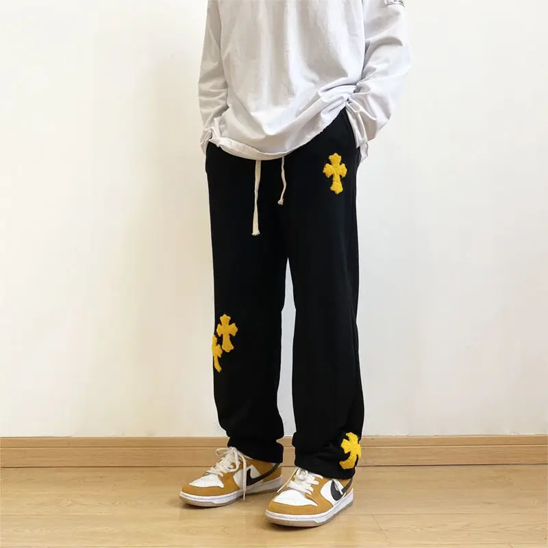 Men's Cross Applique Jeans Korean Fashion Streetwear Hip Hop Towel Embroidered Casual Loose Straight Sports Drawstring Pants
Men's Cross Applique Jeans Korean Fashion Streetwear Hip Hop Towel Embroidered Casual Loose Straight Sports Drawstring Pants