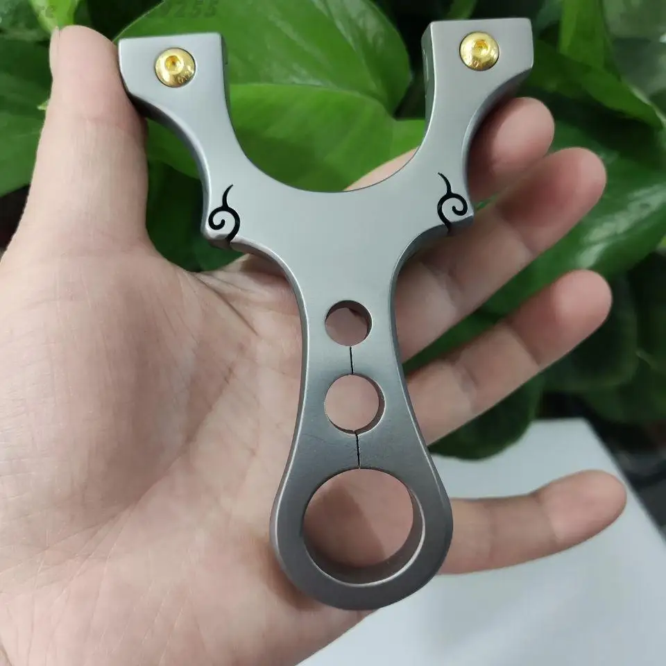 New powerful Titanium Alloy High-precision Slingshot Flat Rubber Band Clip Fast Pressure Ejection Outdoor Hunting slingshot
New powerful Titanium Alloy High-precision Slingshot Flat Rubber Band Clip Fast Pressure Ejection Outdoor Hunting slingshot