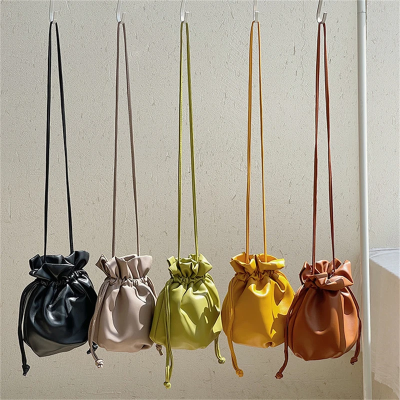 Spring Women's Candy Color Shoulder Totes 2022Fashion Portable Drawstring Pleated Cosmetic Bag Simple Sweet Messenger Bucket Bag
Spring Women's Candy Color Shoulder Totes 2022Fashion Portable Drawstring Pleated Cosmetic Bag Simple Sweet Messenger Bucket Bag