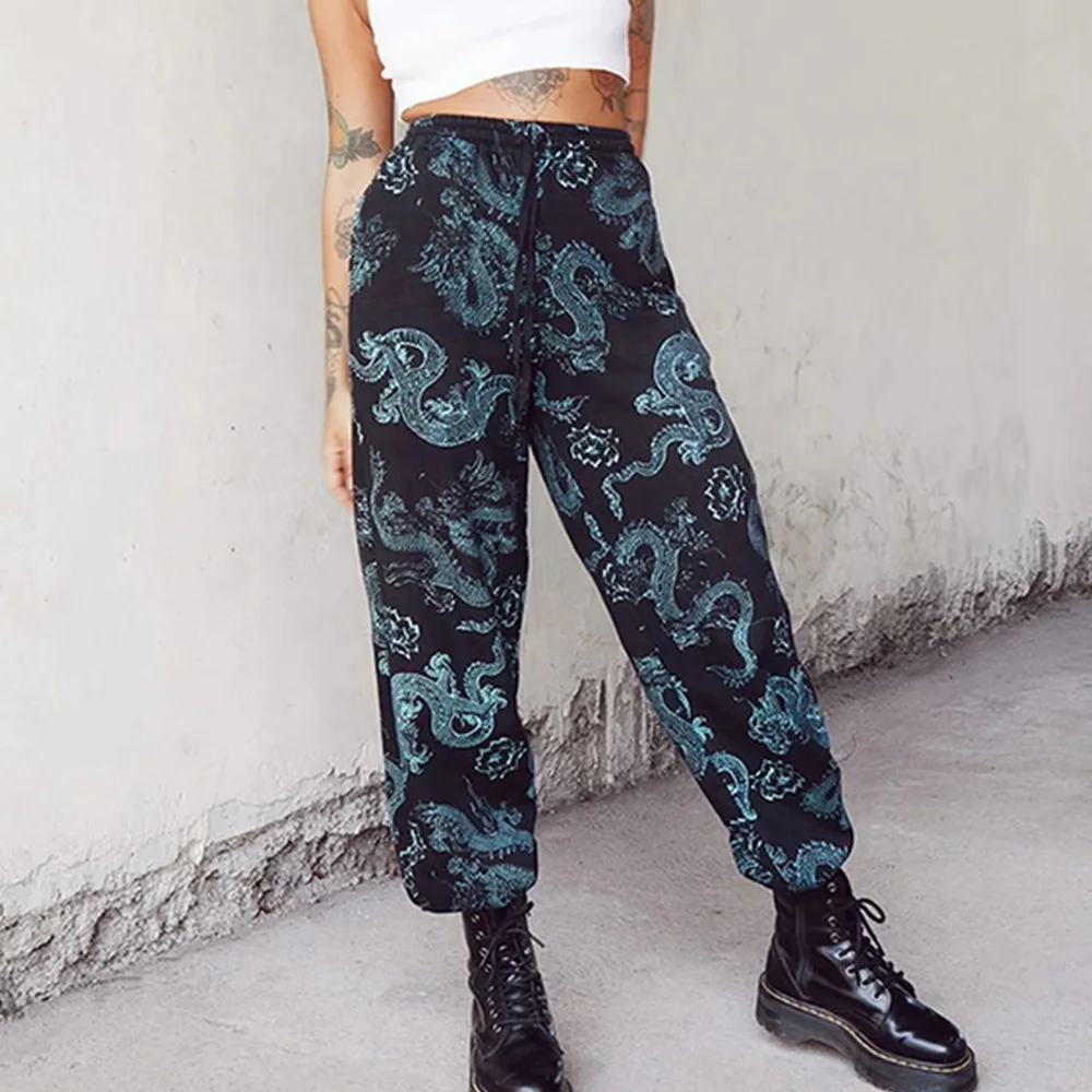 Dragon Print Gothic Black Pants Elastic Bandage Waist Harem Pants Streetwear Goth Loose Casual Pants 2021
Dragon Print Gothic Black Pants Elastic Bandage Waist Harem Pants Streetwear Goth Loose Casual Pants 2021