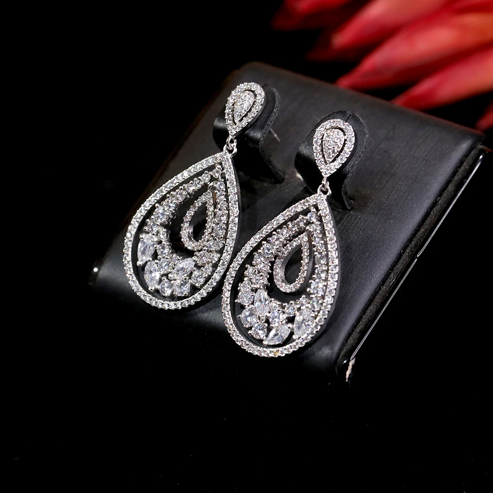 ASNORA женские длинные серьги с большими каплевидными цирконами для невесты, серьги-подвески для свадебной вечеринки, ювелирные изделия 00773
ASNORA женские длинные серьги с большими каплевидными цирконами для невесты, серьги-подвески для свадебной вечеринки, ювелирные изделия 00773