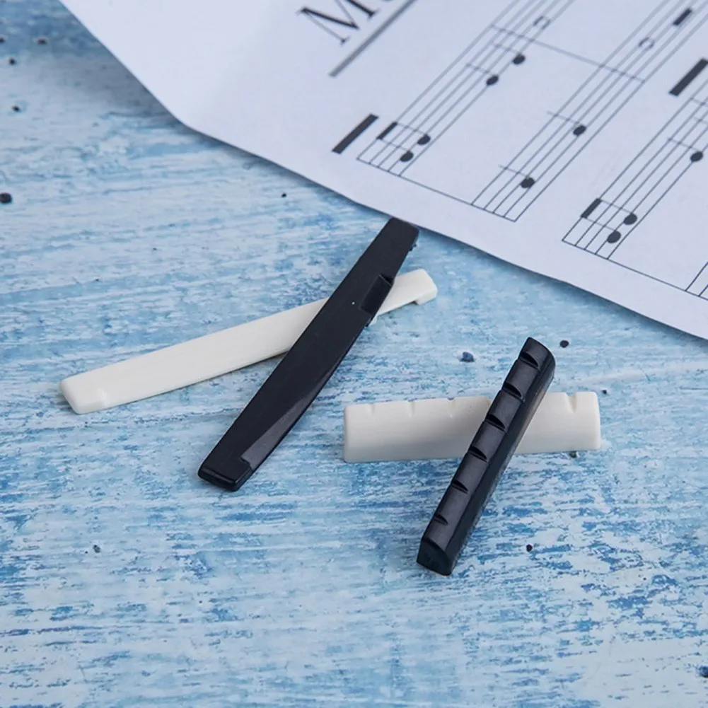 Black/White ABS String Pillow Acoustic Universal Guitar Bridge Saddle Optional Upper/Lower String Pillow Guitar Basses Accs
Black/White ABS String Pillow Acoustic Universal Guitar Bridge Saddle Optional Upper/Lower String Pillow Guitar Basses Accs