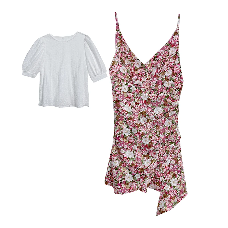 Inside with a hollow white shirt + V-neck slim floral irregular suspender skirt
Inside with a hollow white shirt + V-neck slim floral irregular suspender skirt