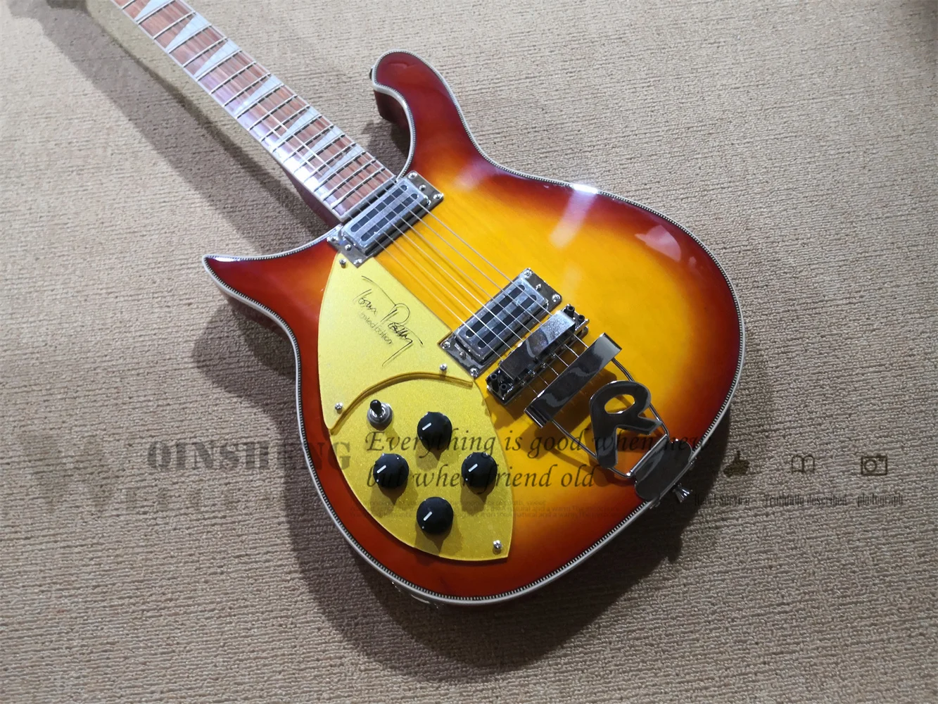 Custom 6 string electric guitar,left hand 360 350 guitar cherry sunburst body gold pickguard white fishbone binding
Custom 6 string electric guitar,left hand 360 350 guitar cherry sunburst body gold pickguard white fishbone binding