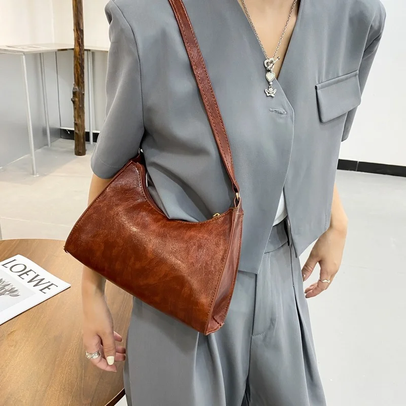 Portable French style trendy texture retro small bag female 2021 new trendy temperament underarm bag messenger bag
Portable French style trendy texture retro small bag female 2021 new trendy temperament underarm bag messenger bag