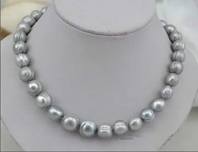 Stunning10-11mm барокко Южное море серебристо-серый жемчужное ожерелье 18-золото 14 карат
Stunning10-11mm барокко Южное море серебристо-серый жемчужное ожерелье 18-золото 14 карат