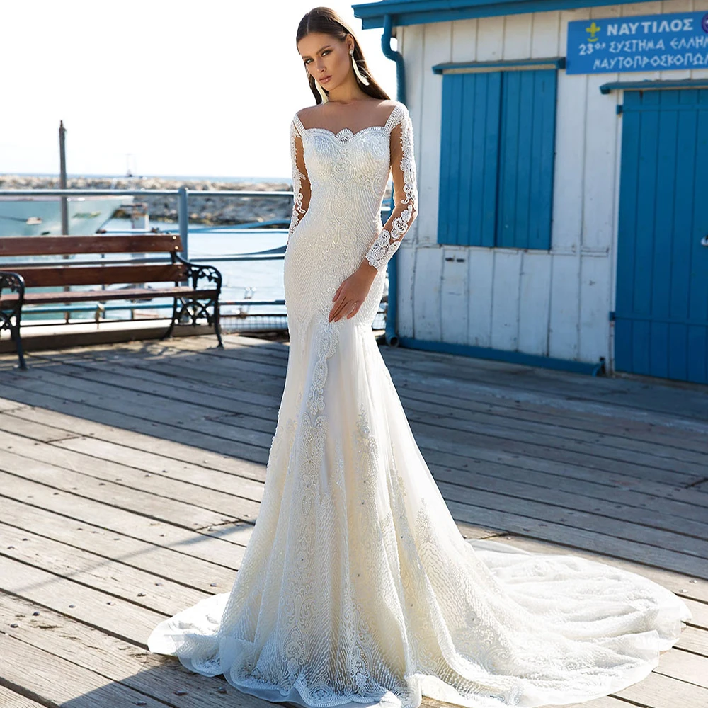 Elegant Wedding Gowns For Bride Mermaid Sexy O Neck Long Sleeves Appliques Beading Vestidos De Novia فساتين زفاف
Elegant Wedding Gowns For Bride Mermaid Sexy O Neck Long Sleeves Appliques Beading Vestidos De Novia فساتين زفاف