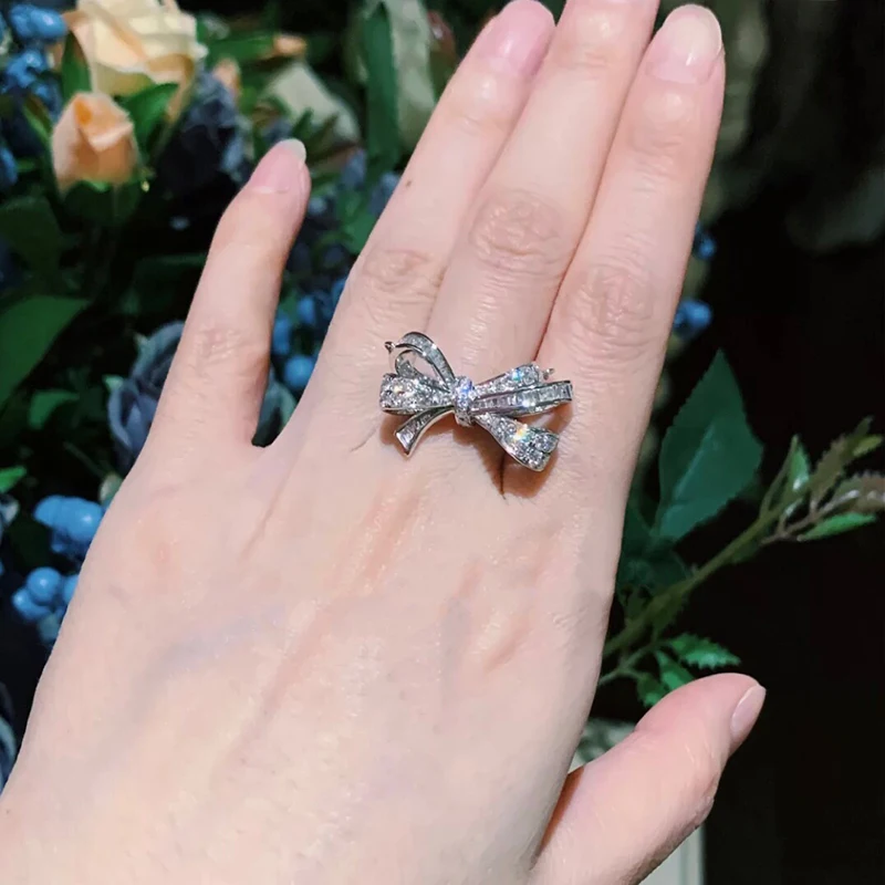 Women's classic fashion full zircon bow S925 sterling silver ring original brand high quality jewelry logo exquisite gift
Women's classic fashion full zircon bow S925 sterling silver ring original brand high quality jewelry logo exquisite gift