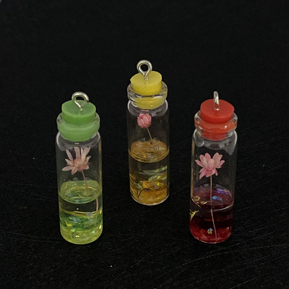 5pcs/bag Colorful Lotus Glass Bottle Pendant Wishing Bottle DIY Jewelry Making Accessories Ladies Earring Craft Necklace Costume 
5pcs/bag Colorful Lotus Glass Bottle Pendant Wishing Bottle DIY Jewelry Making Accessories Ladies Earring Craft Necklace Costume