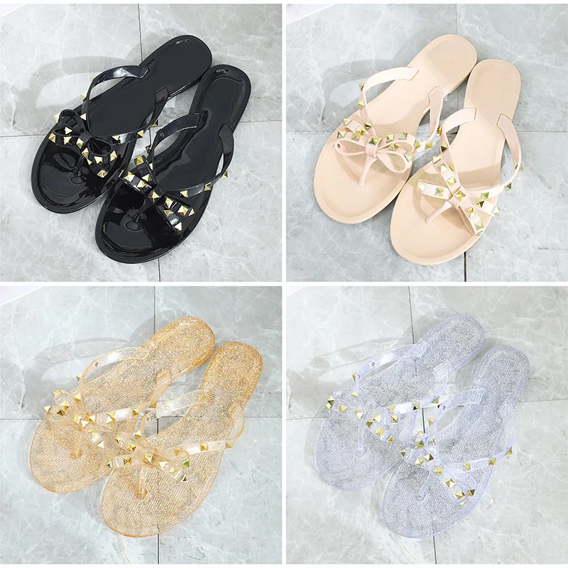 Rivets Bowknot Sandals Summer Woman Beach Flip Flops Jelly Shoes PVC Slides Girls Sandals Slip on Flat with Women Studs Slippers
Rivets Bowknot Sandals Summer Woman Beach Flip Flops Jelly Shoes PVC Slides Girls Sandals Slip on Flat with Women Studs Slippers