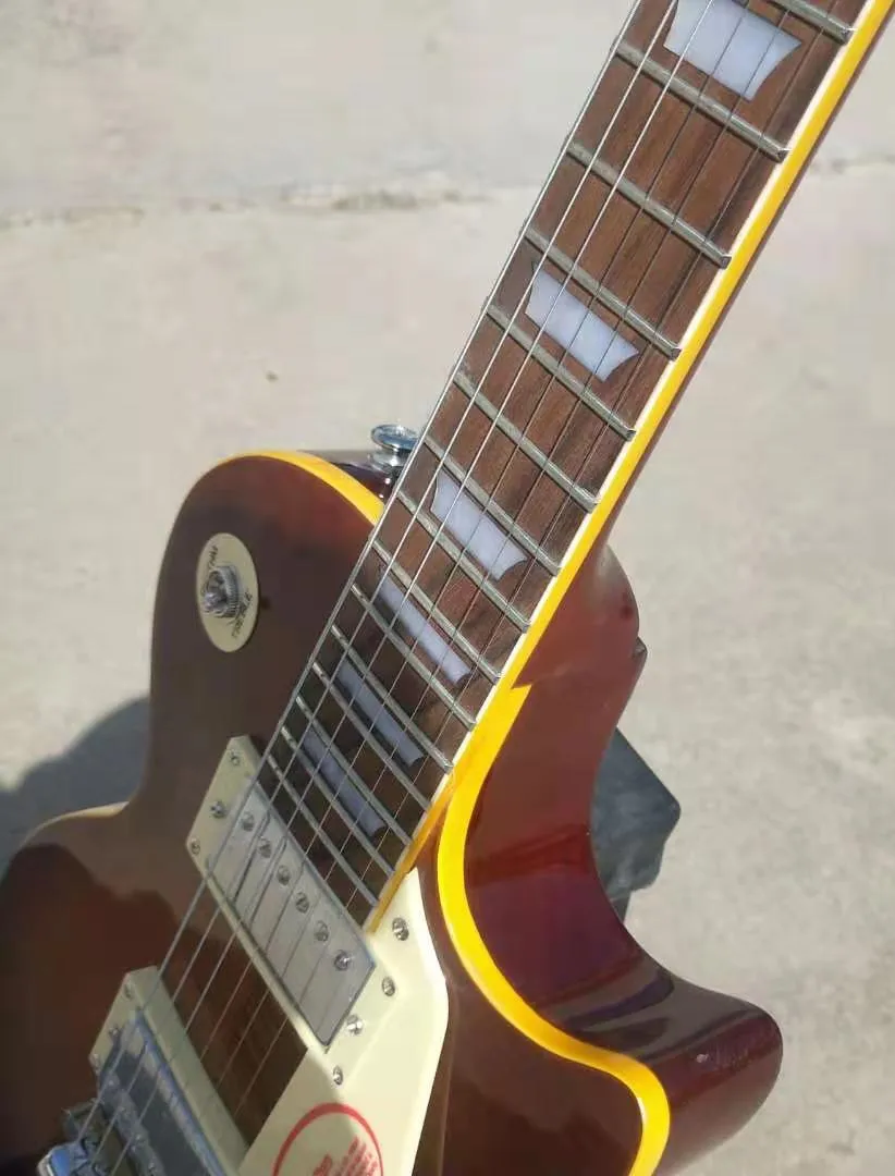 Guitarra elctrica de Jazz Tiger Flame, instrumento de alta calidad, cuerpo de caoba, gitaar, diapasn de palisandro
Guitarra elctrica de Jazz Tiger Flame, instrumento de alta calidad, cuerpo de caoba, gitaar, diapasn de palisandro