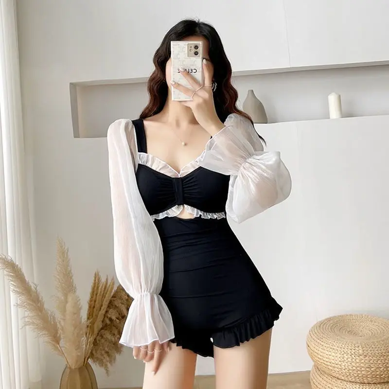 Купальник женский слитный с длинными рукавами, пикантный консервативный облегающий купальник для студентов, приталенный живот, собранный ...
Купальник женский слитный с длинными рукавами, пикантный консервативный облегающий купальник для студентов, приталенный живот, собранный ...