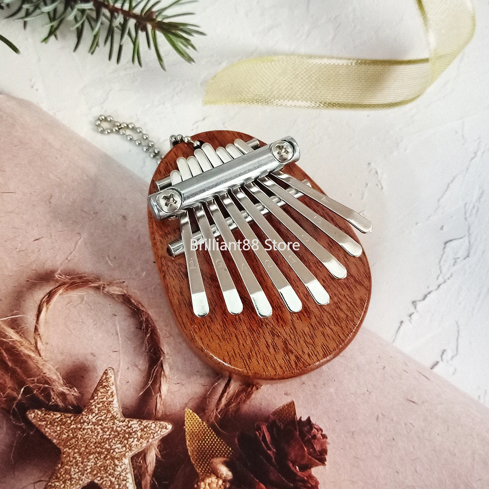 Mini Kalimba 8 Keys Thumb Piano Great Sound Finger Keyboard Musical Instrument Cute Accessory Pendant Gift for Kids Girlfriend
Mini Kalimba 8 Keys Thumb Piano Great Sound Finger Keyboard Musical Instrument Cute Accessory Pendant Gift for Kids Girlfriend