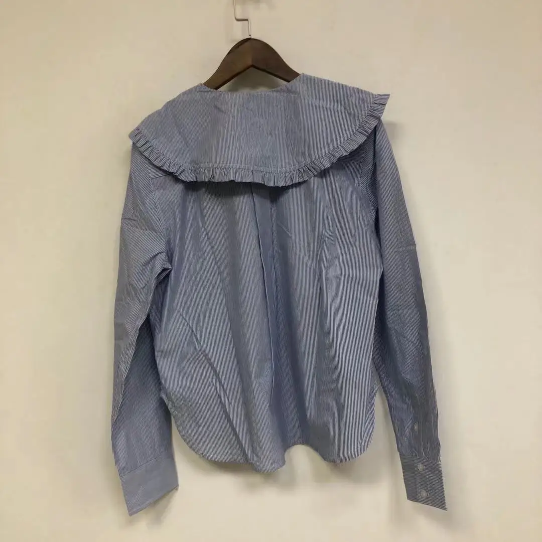 2021 early spring new women's shirt cotton blue stripe Ruffle big Lapel letter embroidery loose
2021 early spring new women's shirt cotton blue stripe Ruffle big Lapel letter embroidery loose