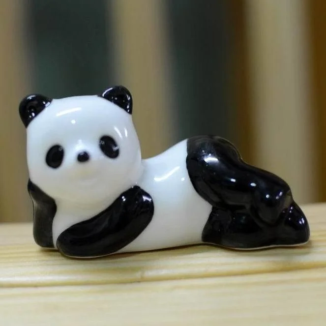 ceramic handicrafts chopsticks rack ceramic panda style lovely chopsticks rest holder flatware tableware wholesale~ 
ceramic handicrafts chopsticks rack ceramic panda style lovely chopsticks rest holder flatware tableware wholesale~