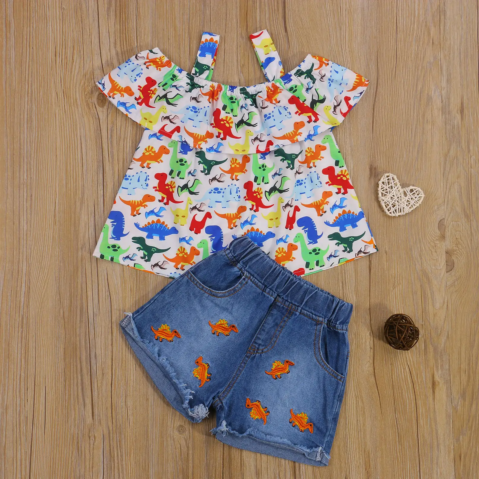 Summer Baby Girls Cartoon Dinosaur Printing Flouncing Suspender Tops + Animal Embroidery Denim Shorts
Summer Baby Girls Cartoon Dinosaur Printing Flouncing Suspender Tops + Animal Embroidery Denim Shorts