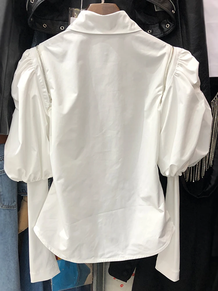 Free shipping Shoulder zipper Hollow puff sleeve stitching thread fake two-piece solid color shirt Ladies autumn new style
Free shipping Shoulder zipper Hollow puff sleeve stitching thread fake two-piece solid color shirt Ladies autumn new style