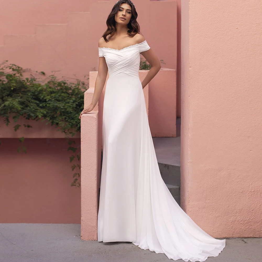 White Wedding Dresses 2021 Draped Chiffon Sleevelesd Ruched Off The Shoulder Court Train Boat Neck Button Back Bridal Gowns
White Wedding Dresses 2021 Draped Chiffon Sleevelesd Ruched Off The Shoulder Court Train Boat Neck Button Back Bridal Gowns