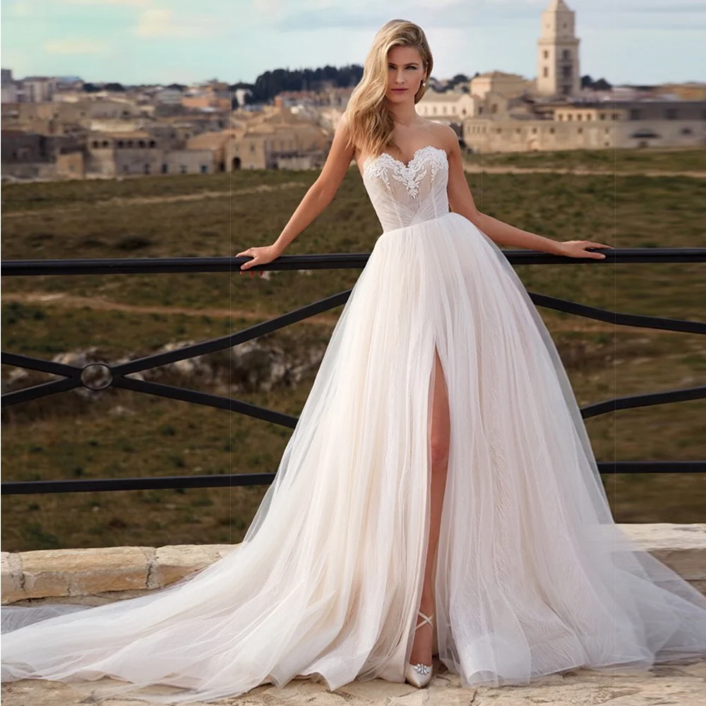Stunning Sweetheart A Line Appliques Sexy Tulle Bridal Gown Custom Made Front Split Beach Boho Wedding Dress es
Stunning Sweetheart A Line Appliques Sexy Tulle Bridal Gown Custom Made Front Split Beach Boho Wedding Dress es