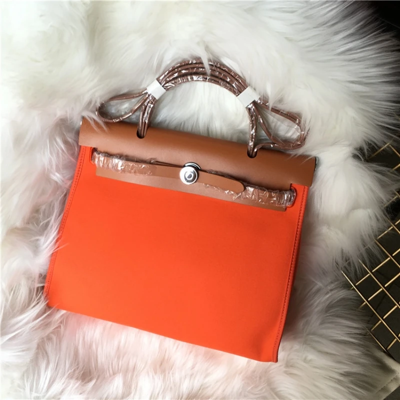 New Fashion Leather and Canvas Women Bag Casual Luxury Designer Handbags Famous Brand High Quality Shoulder Bag Multicolor 
New Fashion Leather and Canvas Women Bag Casual Luxury Designer Handbags Famous Brand High Quality Shoulder Bag Multicolor