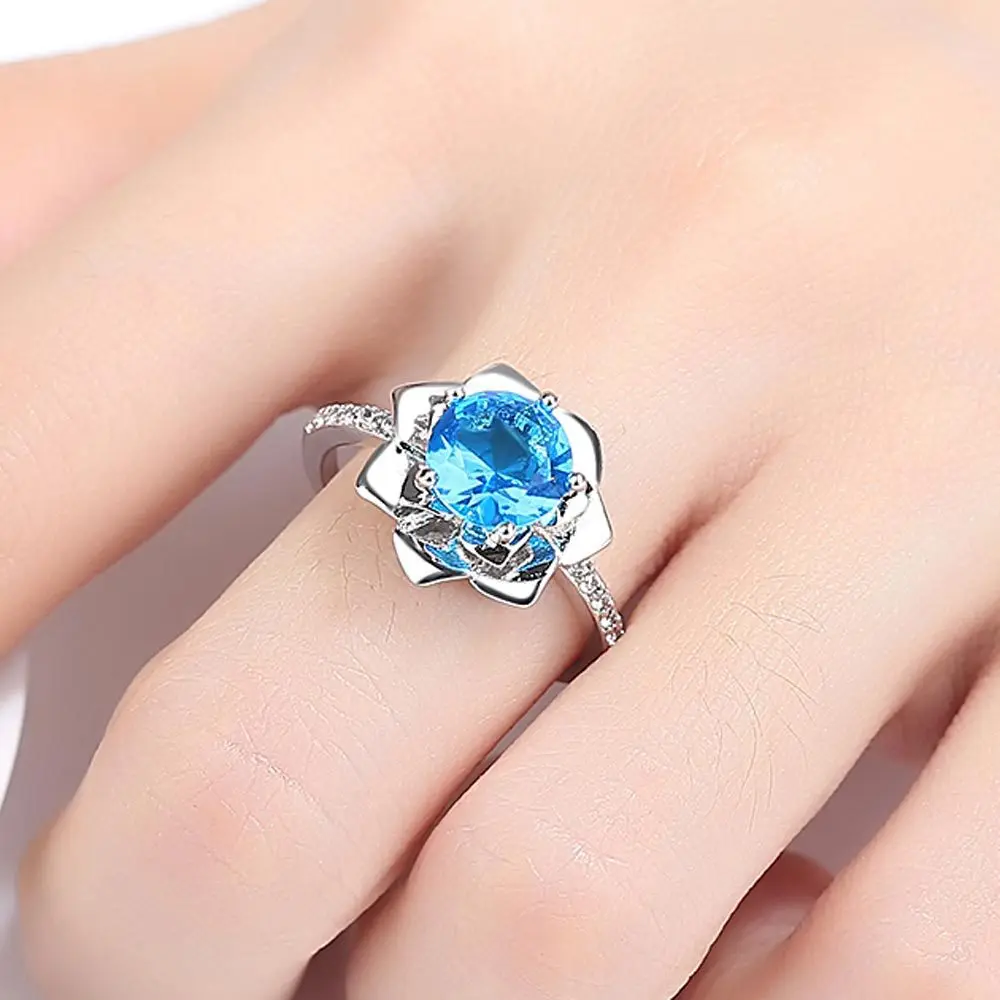 New Fashion Sea Blue Color Sun Flower Rings Cute Big Zircon Stone Ring for Woman Gift Luxury Jewelry Factory Wholesale
New Fashion Sea Blue Color Sun Flower Rings Cute Big Zircon Stone Ring for Woman Gift Luxury Jewelry Factory Wholesale