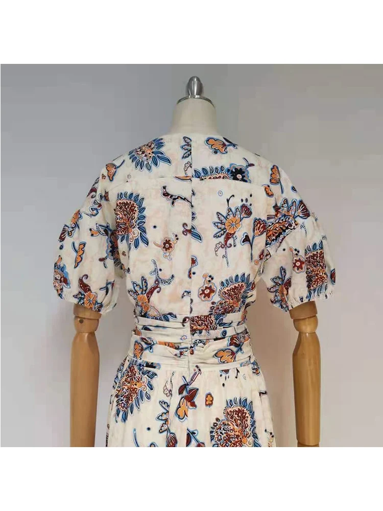 Retro Printed V-neck Pleated Zou Waist Short Top Two-piece Set Ladies Summer New Style High Waist Large Swing Skirt Fashion Suit
Retro Printed V-neck Pleated Zou Waist Short Top Two-piece Set Ladies Summer New Style High Waist Large Swing Skirt Fashion Suit