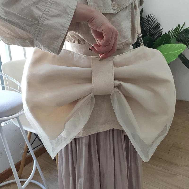New fashion Japanese niche design shoulder bag sense ladies bow knot canvas handbag cute purse 01-SB-sjxzhd
New fashion Japanese niche design shoulder bag sense ladies bow knot canvas handbag cute purse 01-SB-sjxzhd