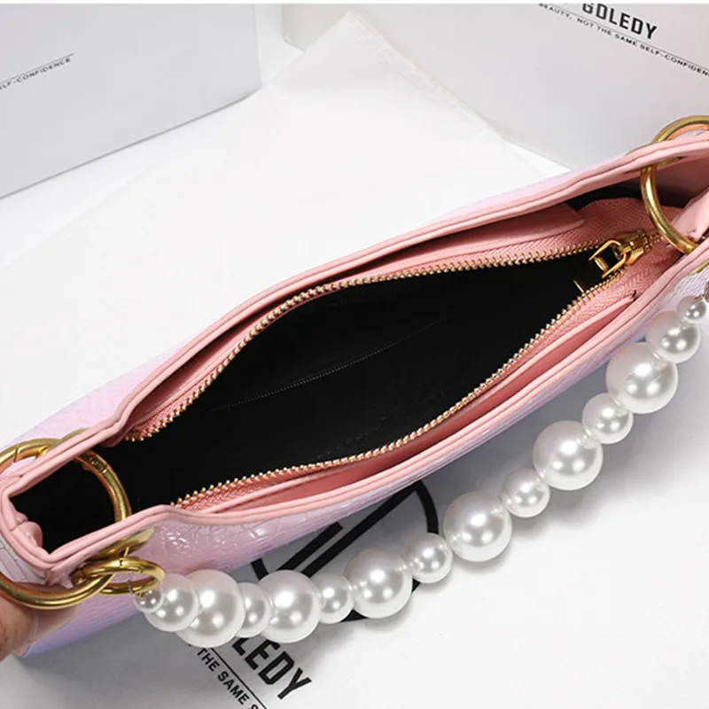 2021New Fashion High-quality Leather Ladies Wallet Baguette Bag Luxury Designer Pearl One-shoulder Armpit Handbag Sac Main Luxe
2021New Fashion High-quality Leather Ladies Wallet Baguette Bag Luxury Designer Pearl One-shoulder Armpit Handbag Sac Main Luxe