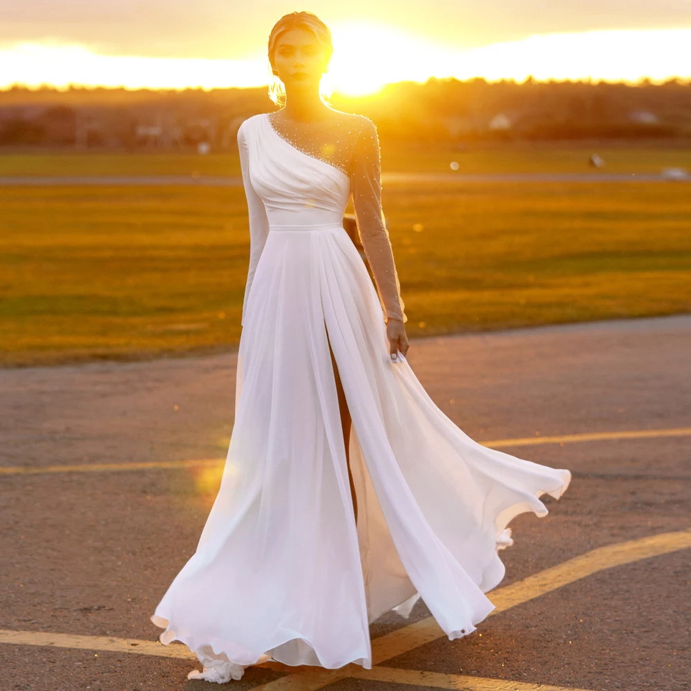 Sexy White Ivory Wedding Dresses Long Sleeves O Neck Beading A Line Chiffon Wedding Gown Slit Bridal Dress 
Sexy White Ivory Wedding Dresses Long Sleeves O Neck Beading A Line Chiffon Wedding Gown Slit Bridal Dress