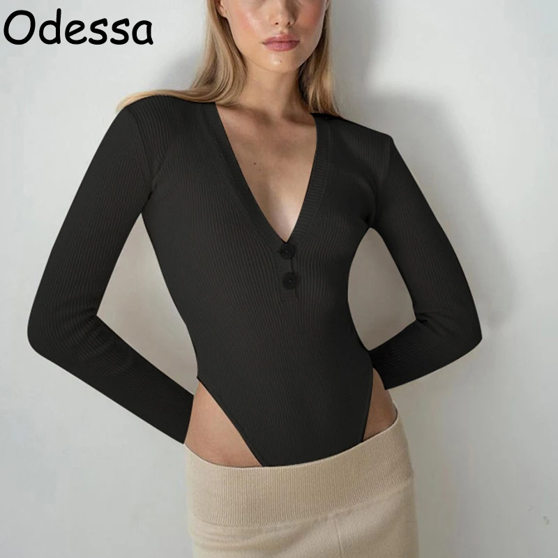 Трикотажное боди с длинным рукавом и V-образным вырезом
Трикотажное боди с длинным рукавом и V-образным вырезом