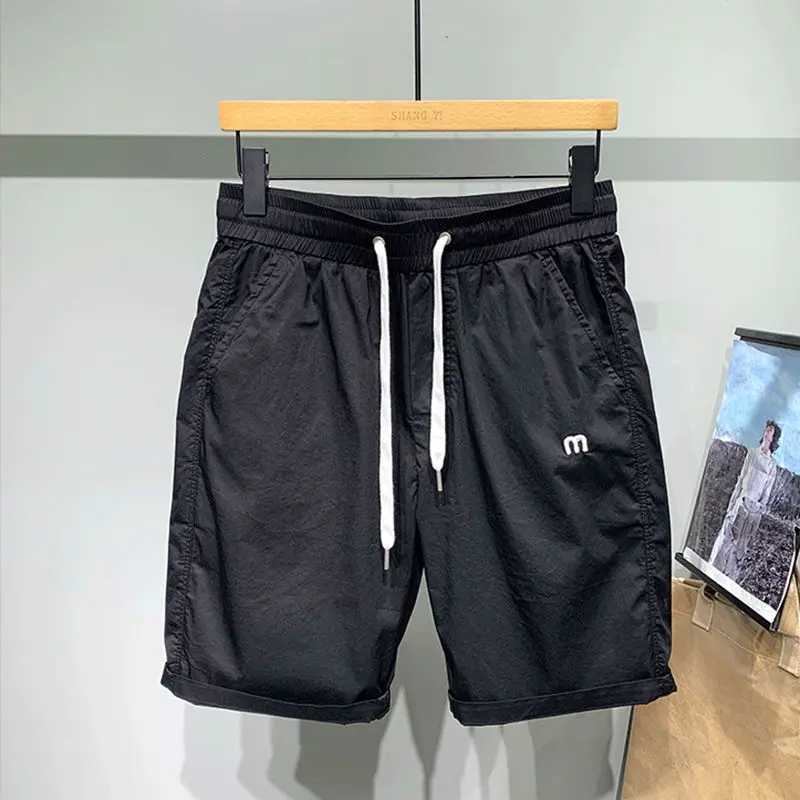 Summer quick drying 5-point pants men's loose and versatile Korean fashion wide leg pants thin student leisure sports shorts
Summer quick drying 5-point pants men's loose and versatile Korean fashion wide leg pants thin student leisure sports shorts