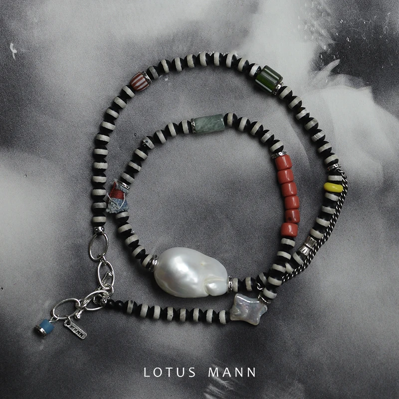 Ожерелье с агатом Lotus Mann, жемчуг в стиле барокко, множество драгоценных камней и неба глаз
Ожерелье с агатом Lotus Mann, жемчуг в стиле барокко, множество драгоценных камней и неба глаз