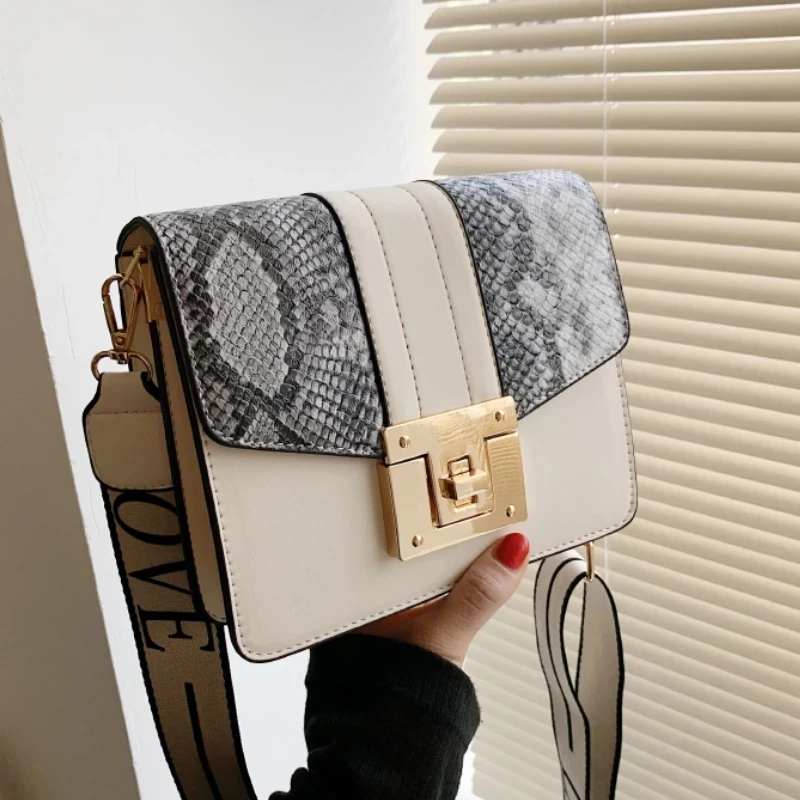 Contrast color Square Crossbody bag 2021 New PU Leather Women's Designer Handbag Wide Shoulder strap Shoulder Messenger Bag
Contrast color Square Crossbody bag 2021 New PU Leather Women's Designer Handbag Wide Shoulder strap Shoulder Messenger Bag