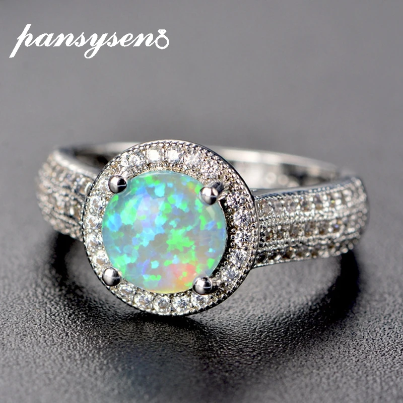PANSYSEN Top Quality Genuine Fire Mystic Opal Ring 925 Sterling Silver Jewelry Rings For Women Wedding Brand Jewelry Wholesale
PANSYSEN Top Quality Genuine Fire Mystic Opal Ring 925 Sterling Silver Jewelry Rings For Women Wedding Brand Jewelry Wholesale
