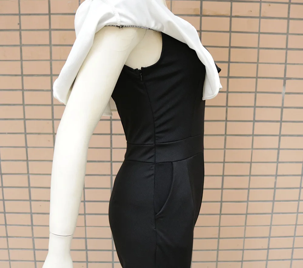 The new autumn winter style sexy one neck tube top ruffle black white color matching solid color fashion slim women's jumpsuit
The new autumn winter style sexy one neck tube top ruffle black white color matching solid color fashion slim women's jumpsuit